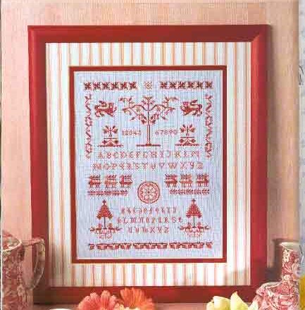 Sampler punto croce rosso con varie figure e simboli (1)